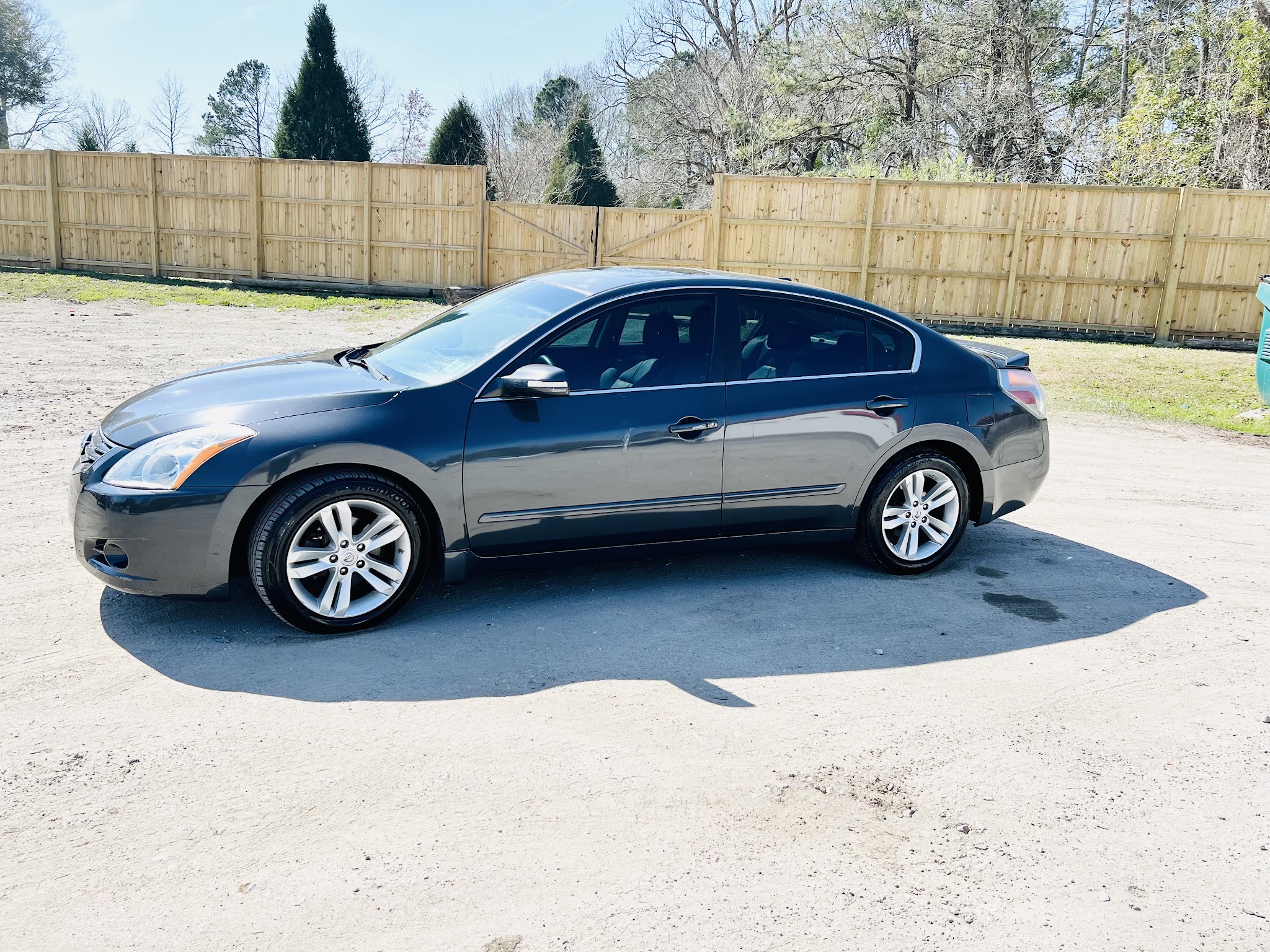 Dark grey Nissan Altima on our lot